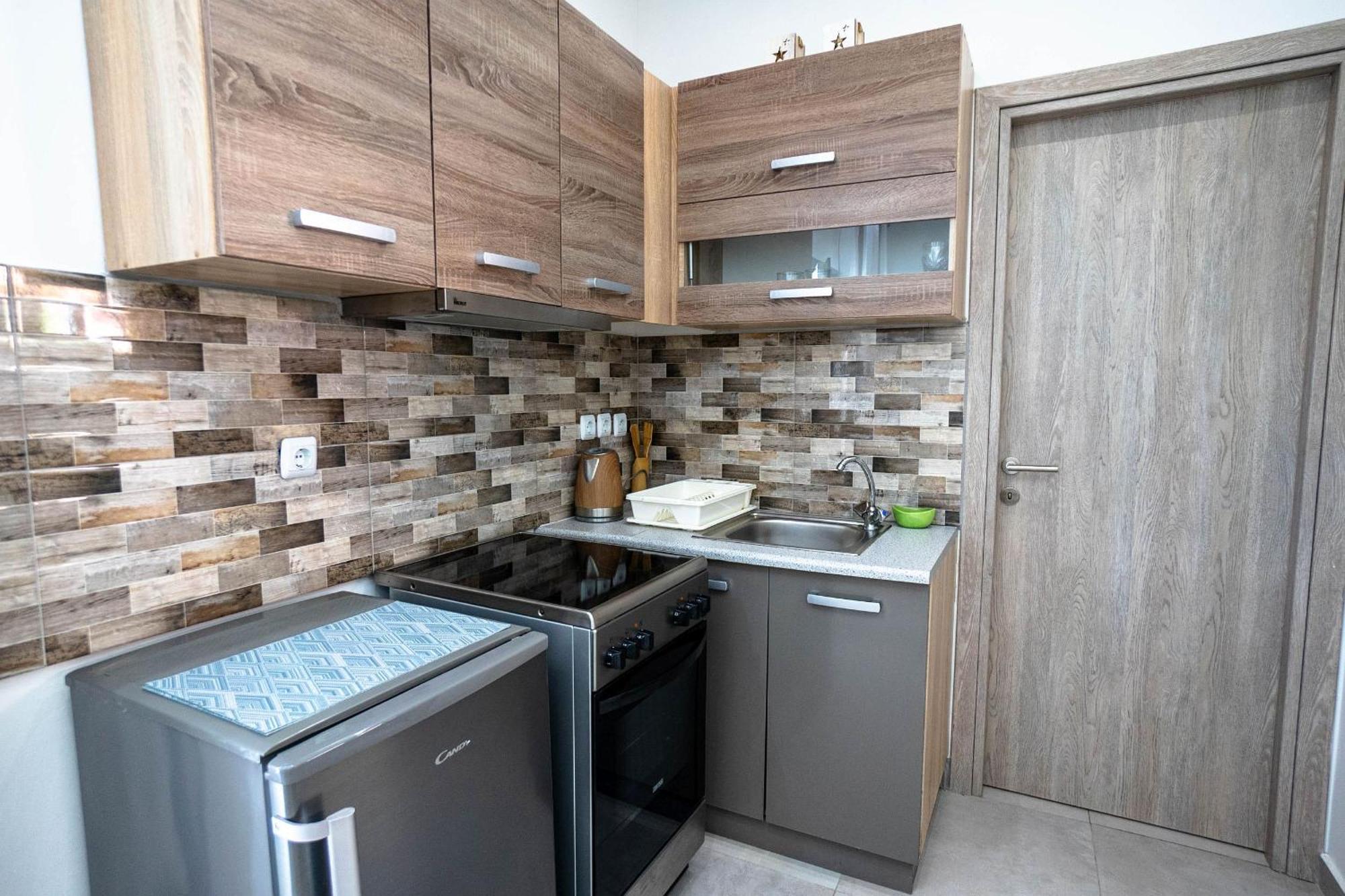 Golden Dolphin Studios & Apartments อาลีเกส ห้อง รูปภาพ